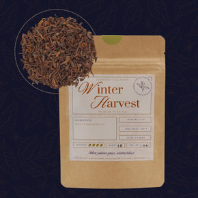 Winter Harvest premium aged pu’er loose-leaf tea in Tea Phases packaging with five-year-aged pu’er tea leaves.
