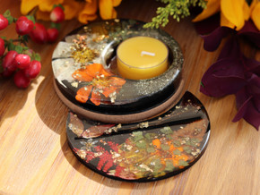 Autumn Alchemy handmade resin candle holder with pressed orange and white flowers, metallic leaf and beeswax tealight.