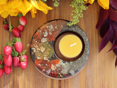 Handmade botanical candle holder with pressed red and yellow flowers, metallic leaf, Pyrite and Shungite in clear resin with a beeswax tealight.