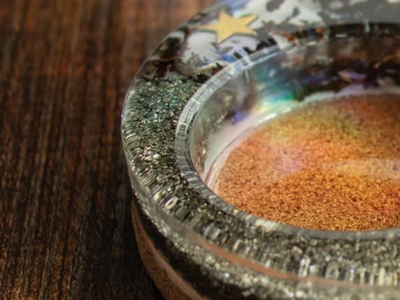 Close up of pyrite pieces seen on the outer rim.