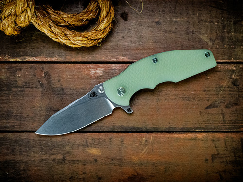 Jurassic-Slicer Hollow Ground-Magnacut-Stonewash Light Blue-Translucent Green G10-Light Blue Titanium Hardware-Scale Side
