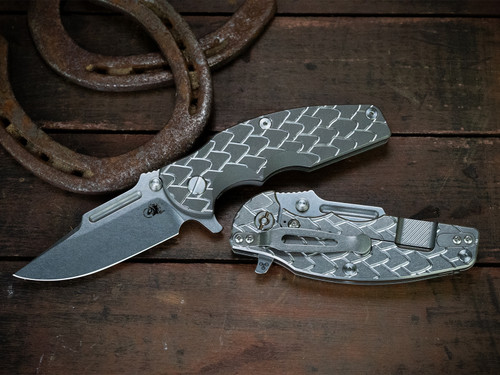CAT-Jurassic-Frontier Clip Point-Magnacut-Stonewash Blade-Dragon Scale Full Titanium