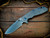 XM-24-S45VN-Slicer-Hollow Ground-Stonewash Blade-Full TI Working Finish-Blue Ti/Orange Stainless Hardware
