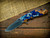 XM-18 3.5" Spearpoint-S45VN-Stonewash Blade-Honeycomb Fade-Blue/Gold-Blue Ti Hardware