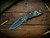 Assembly Special-XM-18 3.5" Spanto-S45VN-Stonewash Blade-Full Titanium Battle Black-Stars and Stripes-Copper Hardware-Scale Side