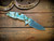 Jurassic-Slicer Hollow Ground-Magnacut-Light Blue/Bronze-Grey G10-Bronze Ti hardware/Ti TS