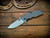 Assembly Special-Jurassic-Slicer Hollow Ground-Magnacut-Bead Blast-Grey G10-Blue Titanium Hardware/TS-Scale Side
