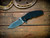 Assembly Special-Jurassic-Slicer Hollow Ground-Magnacut-Stonewash Bronze/Purple-Black G10-Bronze Titanium Hardware-Scale Side 