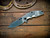 Assembly Special-Jurassic-Slicer Hollow Ground-Magnacut-Full Titanium Stonewash-Milled Horsehead-Black Nitride Hardware-Holey Clip-Scale Side