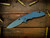 XM-18 3.5" Skinny Slicer-Hollow Ground-Magnacut-Full Ripple Titanium-Battle Blue