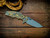 Jurassic-Slicer Hollow Ground-Magnacut-Battle Green Special Finish-Coyote G10-Light Blue Titanium Hardware-Lockside
