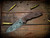 The Emmett-Magnacut-BPU1264-Burgandy Micarta-Scale Side