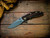 Assembly SPecial-XM-18 3.5"-20CV-Slicer-Hollow Ground-Two Tone-Battle Green-Macassar Ebony-Battle Green Titanium Hardware/Brass Standoffs-Scale Side