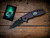 XM-18 3.5" Bowie-Magnacut-Headless Horseman Battle Black-Purple/Black G10 - With Patch - Scale side