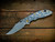 XM-18 3.5" Artistry Series - Production - Blue Bead Blast with Scroll Engraving - Matt Finish Non-Flipper Bowie-Scale Side