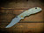 XM-18 3.5" Artistry Series - Production - Green Bead Blast with Scroll Engraving - Matt Finish Non-Flipper Bowie-Scale Side