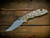 XM-18 3.5" Artistry Series - Production - Bronze Bead Blast with Scroll Engraving - Matt Finish Non-Flipper Bowie-Scale Side