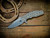 Jurassic-Frontier Clip Point-Magnacut-Stonewash Blade-Dragon Scale Full Titanium Working Finish-Scale Side