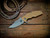 Jurassic-Frontier Clip Point-Magnacut-Battle Blue-Coyote G10