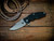 Jurassic-Frontier Clip Point-Magnacut-Battle Blue-Black G10