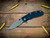 XM-18 3.25" Spanto-Magnacut-Battle Blue-Blur Black G10