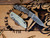 XM-18 3.25" Spanto Non-Flipper-Magnacut-Working Finish-Stonewash Blade-G10