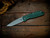 Firetac Spanto-Assembly-Special-20CV-Working Finish-Dark Green G10-Scale Side