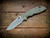XM-18 3.5" Recurve-Non Flipper-Magnacut-Liberty Bell Battle Green-Brass Hardware_Scale Side