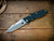 Eklipse 3.5" Skinny Fullered Harpoon Spanto Non Flipper-Magnacut-Stonewash Gold/Blue-Black G10-Titanium Hardware-Scale Side