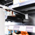 Close-Up of Magnetic Base Fixing on Metal Shelf Banner Hanger