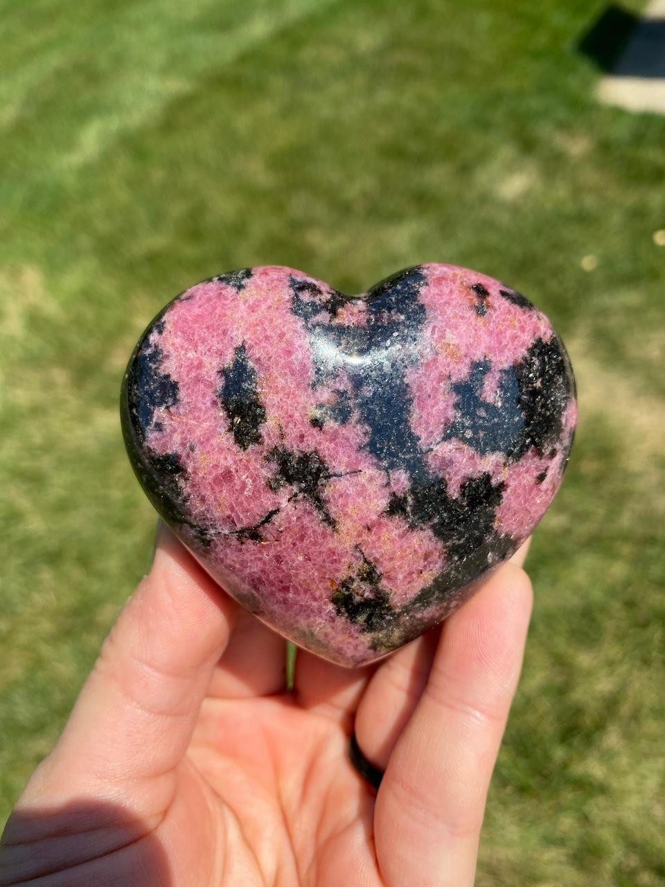 https://cdn11.bigcommerce.com/s-74zp6w28re/images/stencil/1280x1280/products/6145/37999/new-moon-beginnings-rhodonite-heart-polished-stone-csp-aa706-parent__11136.1635556491.jpg