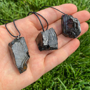 Elite Shungite Pendant in Cord - Raw Pendant in Drilled Setting Elite Shungite Pendant in Cord - Raw Pendant in Drilled Setting