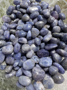 Tanzanite Tumbled Stones Grade A, a bowl of polished lavender and violet-blue Tanzanite with white veining