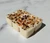 Side angle of Winter Spice Wax Melts showing six cream soy wax cubes topped with Carnelian, Garnet and dried orange