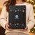Woman holding the closed New Moon Beginnings crystal advent calendar box with silver snowflake design