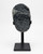 Front view of a Uruguayan Black Amethyst cluster on a black iron stand against a plain white background