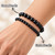 6mm and 8mm Black Obsidian Elastic Bracelets worn together on one wrist to compare bead sizes