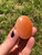 Peach Selenite Palm Stone - Polished Stone Oval