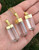 Clear Quartz Polished Point Pendant in Capped Metal Setting