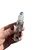 New Moon Oil Roller held in hand with the Amethyst roller ball on top