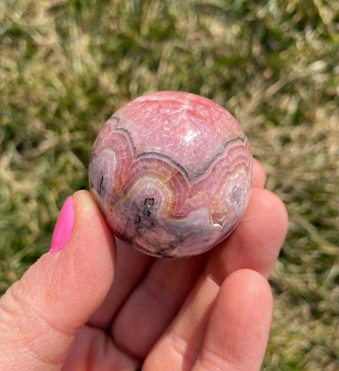 Rhodochrosite Sphere - Polished Stone