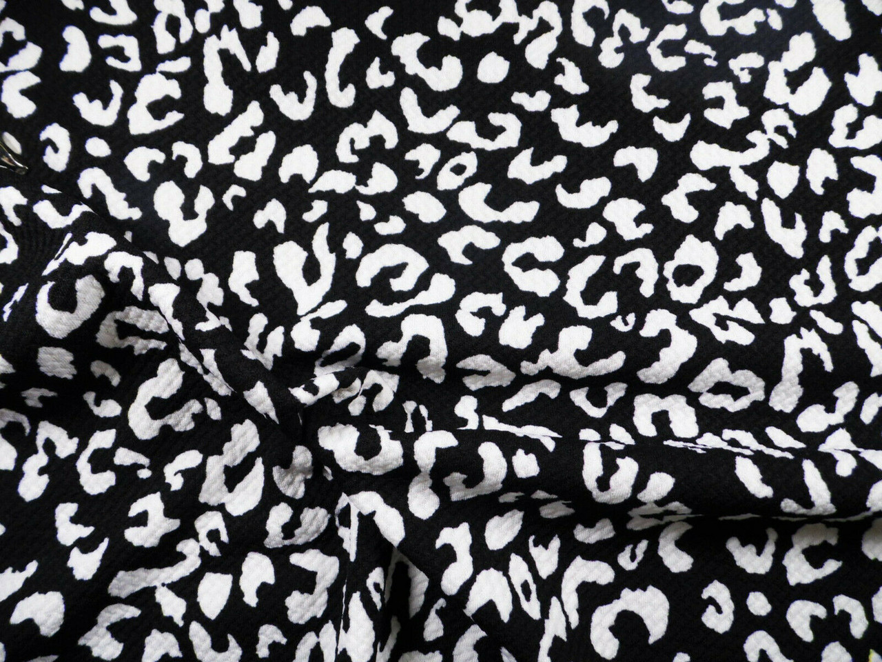 Bullet Printed Liverpool Textured Fabric Stretch Cheetah Black With White Bullet Printed Liverpool Textured Fabric Stretch Cheetah Black With White