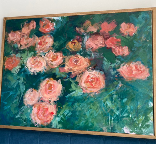 In the enchanting and evocative painting titled "Reading by the Light of Flowers," Shakia transports viewers to a world where the serene beauty of an abstract rose garden bathed in coral, orange, and pink hues serves as the backdrop for a moment of quiet contemplation. 

Against the deep green background, this composition captures the enchantment of nature's embrace and the soothing power of literature.