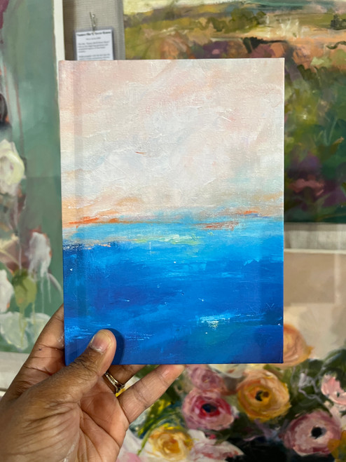 Embark on a literary journey with our Hardcover Journal adorned with a captivating English seascape. Let the tranquil beauty of the sea inspire your thoughts as you fill its finely lined pages with your ideas and musings. Immerse yourself in the serenity of the coast with every word penned in this sophisticated hardcover journal – a perfect companion for capturing your thoughts by the shore.