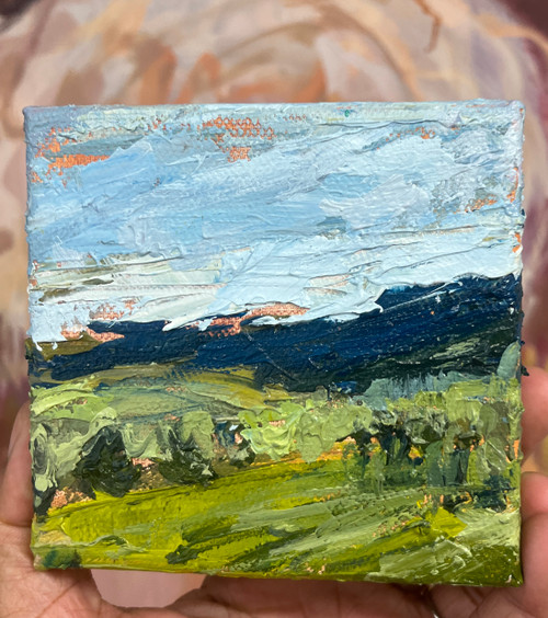 Shop I See Trees of Green, a 4x4 original textured oil landscape by Shakia Harris featuring rolling green fields, distant hills, and a luminous blue sky.