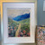 Wildflower meadow canvas print with colorful flowers, winding path and blue mountains by Shakia Harris