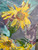 The sunflowers, rendered with textured strokes using a palette knife, symbolize the woman's transformative journey. In the foreground, they stand tall and unyielding, reflecting her newfound strength. Against a purple background, the chosen color palette signifies healing and introspection, a visual representation of the emotional process she underwent.