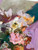 Close-up detail of abstract floral graffiti-style oil painting showing expressive brushstrokes, layered texture, and vibrant purple, orange, and teal paint application.