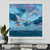 Modern abstract seascape wall art featuring sweeping blue, teal, lavender, and aqua tones with expressive impressionistic texture and a peaceful ocean horizon. This framed coastal canvas print by Shakia Harris is designed with fade-resistant archival inks, water-resistant protection, and a textured canvas surface for a gallery-inspired finish. The calming coastal palette and atmospheric movement make this oversized artwork ideal for creating a relaxing, sophisticated focal point in bedrooms, living rooms, offices, and contemporary interiors inspired by the sea.