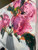 Close-up of textured pink and magenta peony petals in Funny How Time Flies, highlighting thick expressive oil paint and layered brushwork.